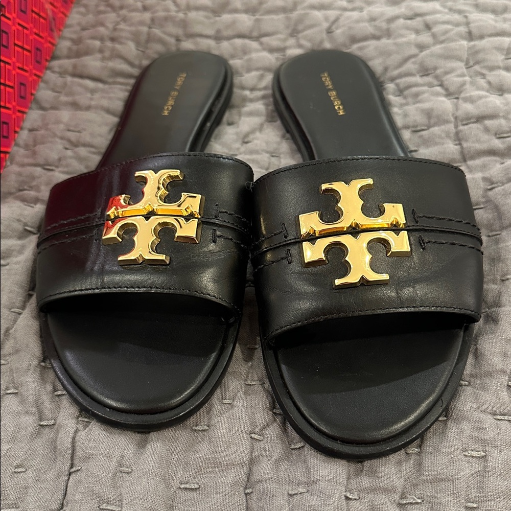 Like Nee Tory Burch Black and Gold Sandals